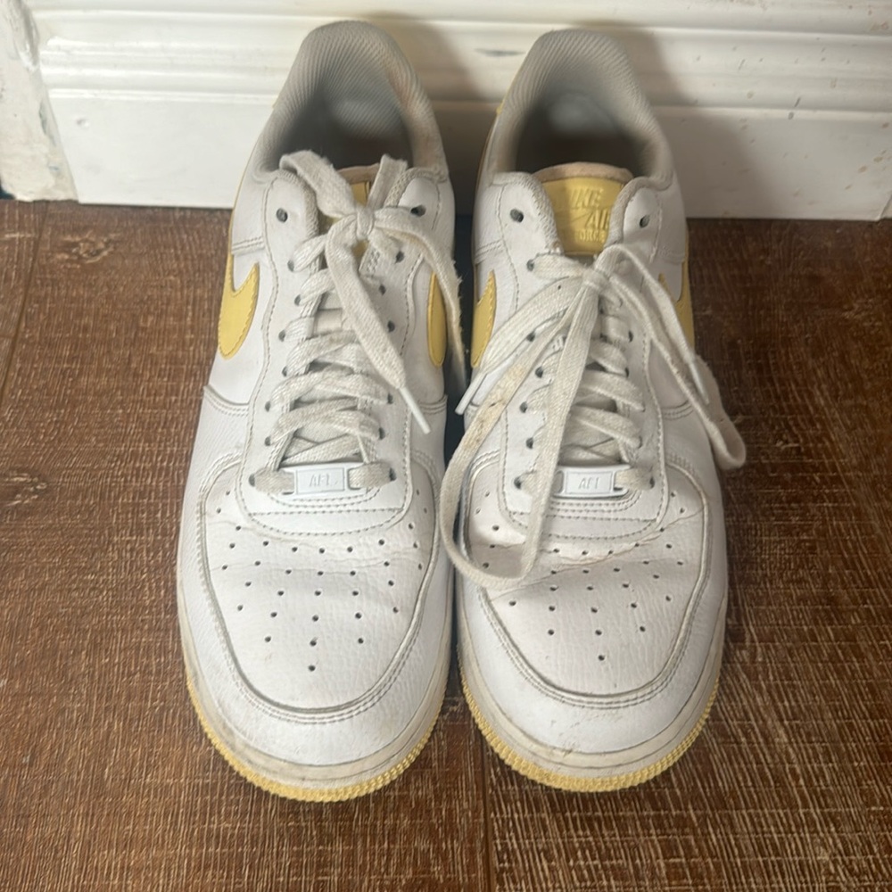 White and yellow Air Force 1s